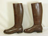 SA marked brown boots