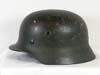 Army M40 combat helmet with remnants of camouflage finish