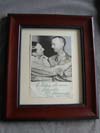 Autographed photo of General Douglas MacArthur congratulating General Wainwright on his release from Japanese captivity