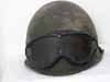 World War II U.S. Army M1 combat helmet with original field goggles