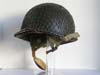 Army paratroop helmet with combat netting